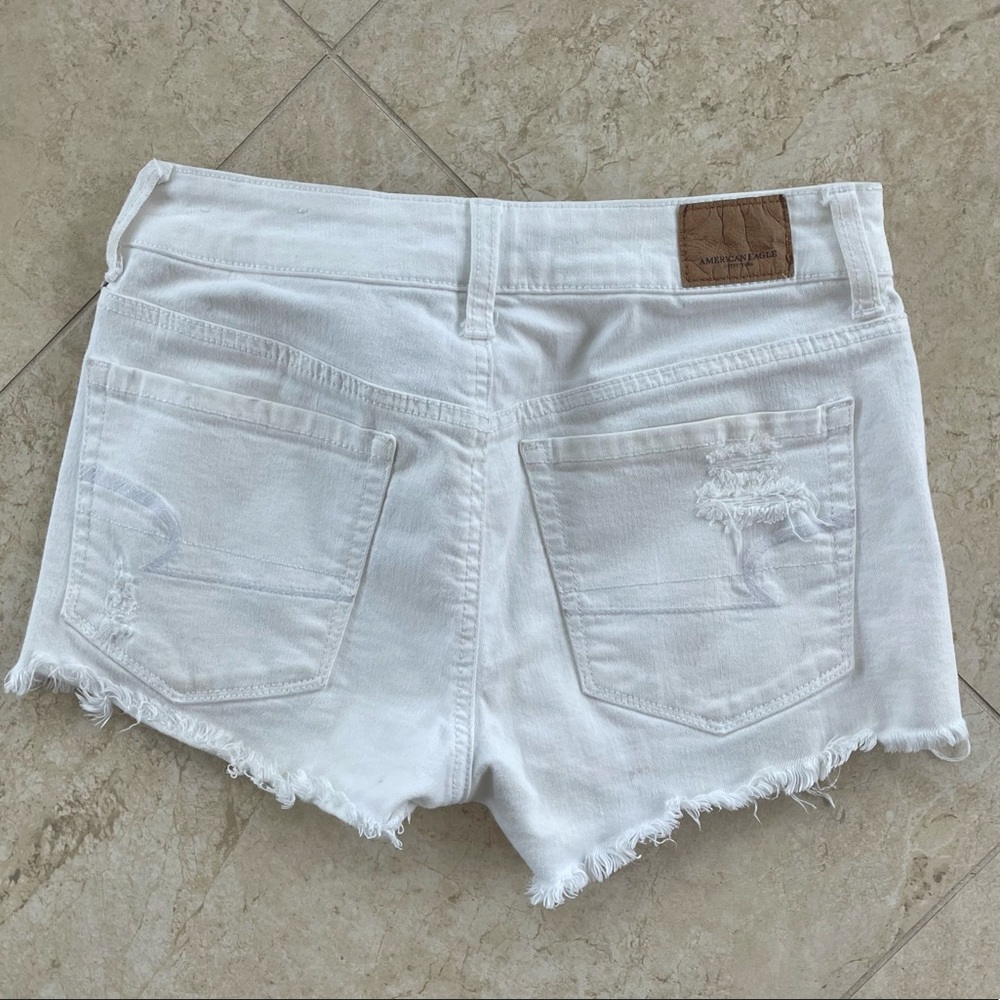 AE White distressed jean shorts